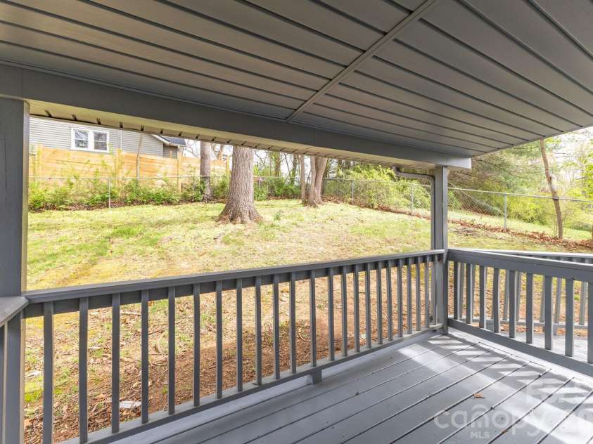 147 Elkwood Road, Asheville, NC 28804.  MLS# CAR4366440, YatesRealty ID 20921. Covered back deck