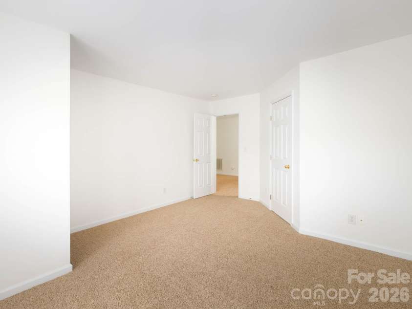 125 Kallie Loop, Mooresville, NC 28117.  MLS# CAR4344467, YatesRealty ID 20923. Every bedroom features a spacious walk-in closet. 
