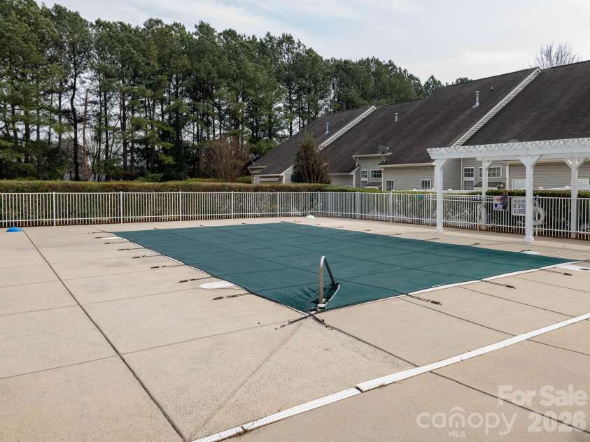 125 Kallie Loop, Mooresville, NC 28117.  MLS# CAR4344467, YatesRealty ID 20923. Relax and play at the community pool.