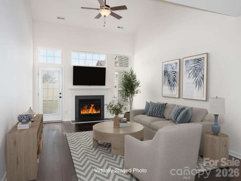 125 Kallie Loop, Mooresville, NC 28117.  MLS# CAR4344467, YatesRealty ID 20923. Virtually Staged. Light-filled, open great room.