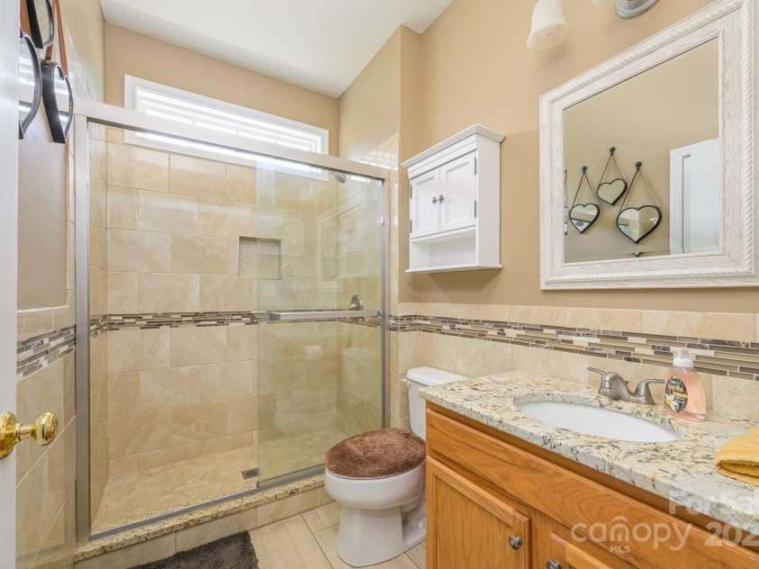 7737 Pleasant Valley Drive, Harrisburg, NC 28075.  MLS# CAR4273396, YatesRealty ID 20923. Main Floor Guest Bath