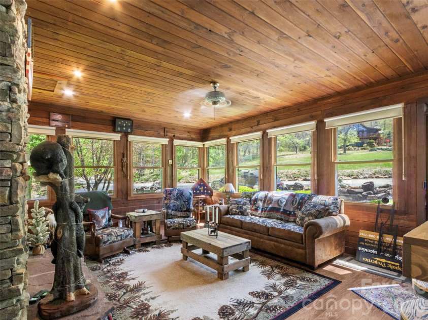 129 Apple Farm Road, Bakersville, NC 28705.  MLS# CAR4375301, YatesRealty ID 20926. Sunroom 