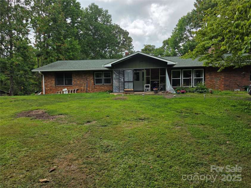 244 Mcmahan Lane, Bakersville, NC 28705.  MLS# CAR4269540, YatesRealty ID 20927. Front view of the house