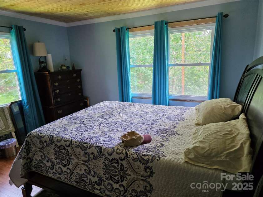 244 Mcmahan Lane, Bakersville, NC 28705.  MLS# CAR4269540, YatesRealty ID 20927. One of four bedrooms