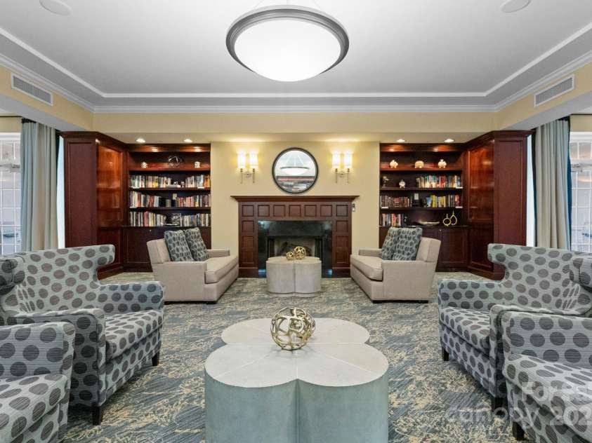 300 5th Street, Charlotte, NC 28202.  MLS# CAR4332845, YatesRealty ID 20929. Library with gas fireplace