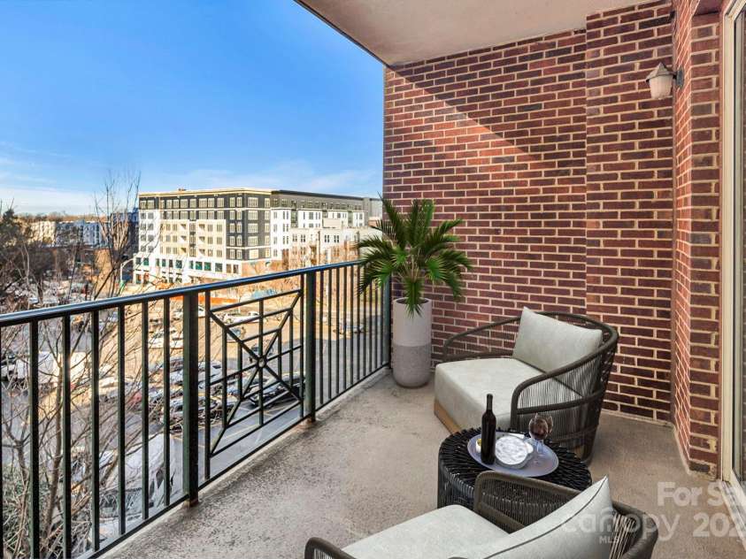 300 5th Street, Charlotte, NC 28202.  MLS# CAR4332845, YatesRealty ID 20929. Virtually staged balcony