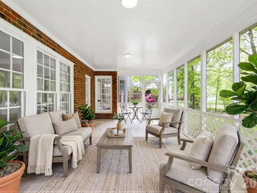 5407 Berrywood Lane, Monroe, NC 28110.  MLS# CAR4367103, YatesRealty ID 20929.  Large screen porch. Virtually staged.