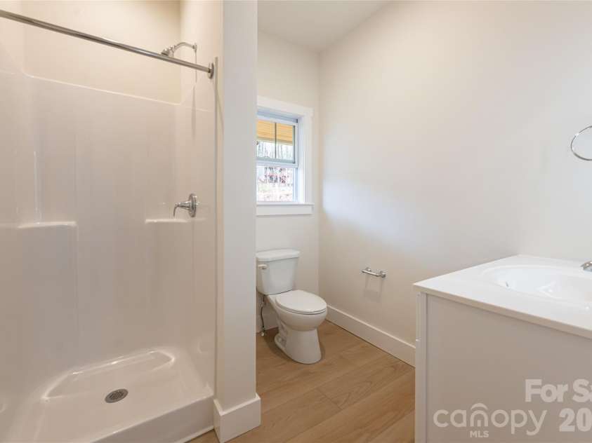 165 Cascade Ridge Road, Fairview, NC 28730.  MLS# CAR4351945, YatesRealty ID 20935. Guest Bath - Main