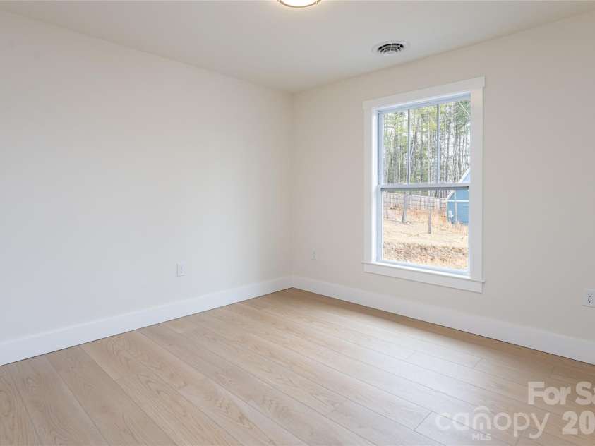165 Cascade Ridge Road, Fairview, NC 28730.  MLS# CAR4351945, YatesRealty ID 20935. Guest Bedroom 1