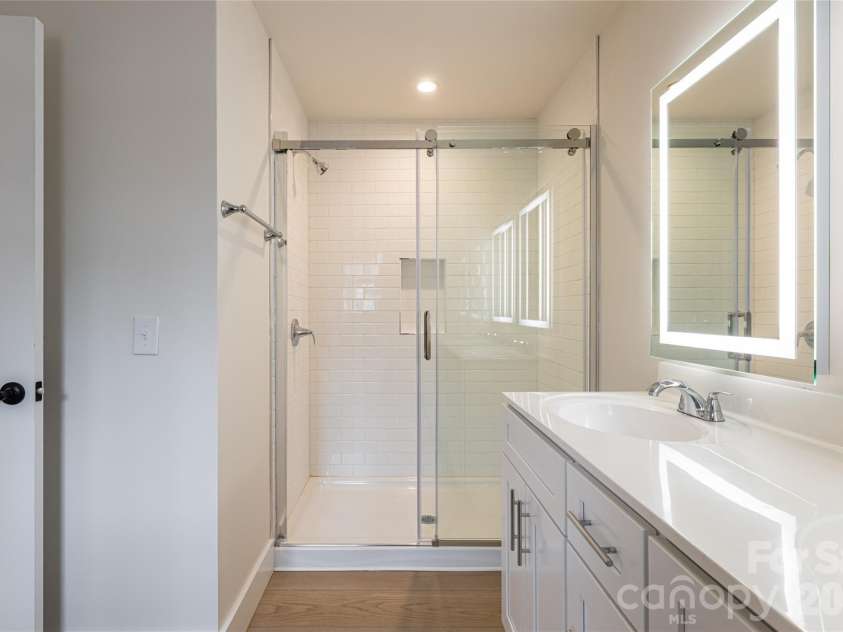 165 Cascade Ridge Road, Fairview, NC 28730.  MLS# CAR4351945, YatesRealty ID 20935. Owner's Bath
