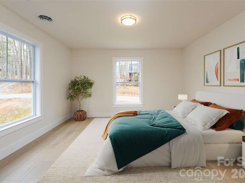 165 Cascade Ridge Road, Fairview, NC 28730.  MLS# CAR4351945, YatesRealty ID 20935. Owner's Bedroom