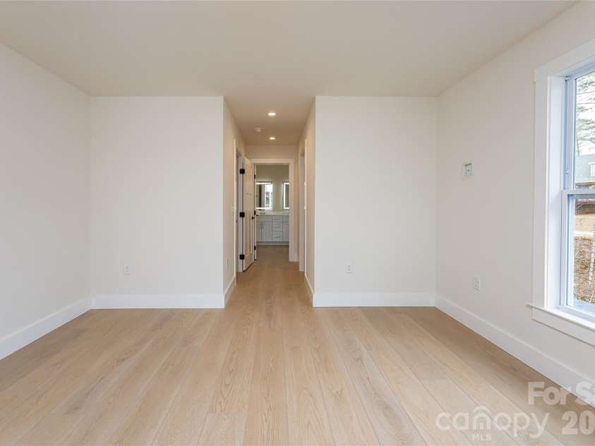 165 Cascade Ridge Road, Fairview, NC 28730.  MLS# CAR4351945, YatesRealty ID 20935. Owner's Bedroom