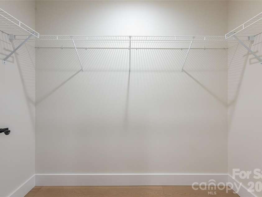 165 Cascade Ridge Road, Fairview, NC 28730.  MLS# CAR4351945, YatesRealty ID 20935. Owner's Walk-In Closet