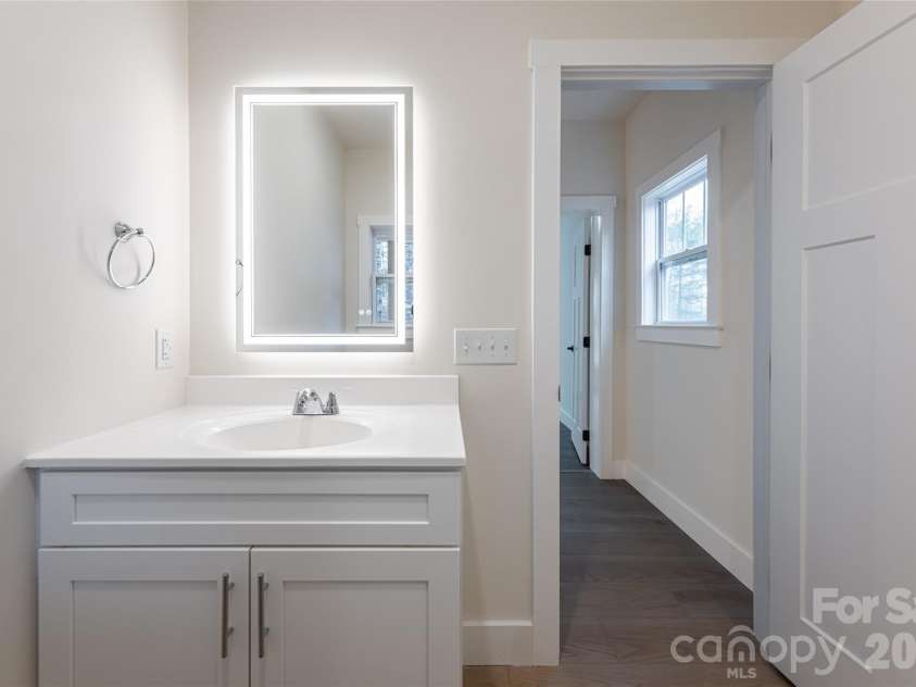 169 Cascade Ridge Road, Fairview, NC 28730.  MLS# CAR4351388, YatesRealty ID 20936. Guest Bath 1 - Main