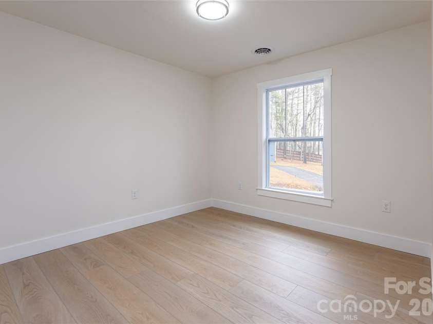 169 Cascade Ridge Road, Fairview, NC 28730.  MLS# CAR4351388, YatesRealty ID 20936. Guest Bedroom 1