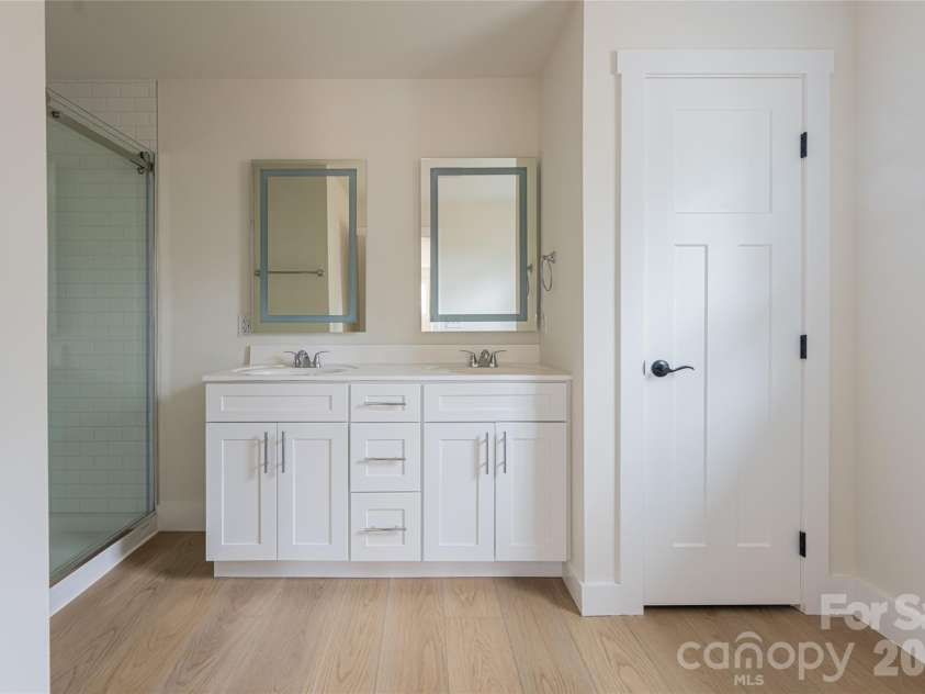 169 Cascade Ridge Road, Fairview, NC 28730.  MLS# CAR4351388, YatesRealty ID 20936. Owner's Bath