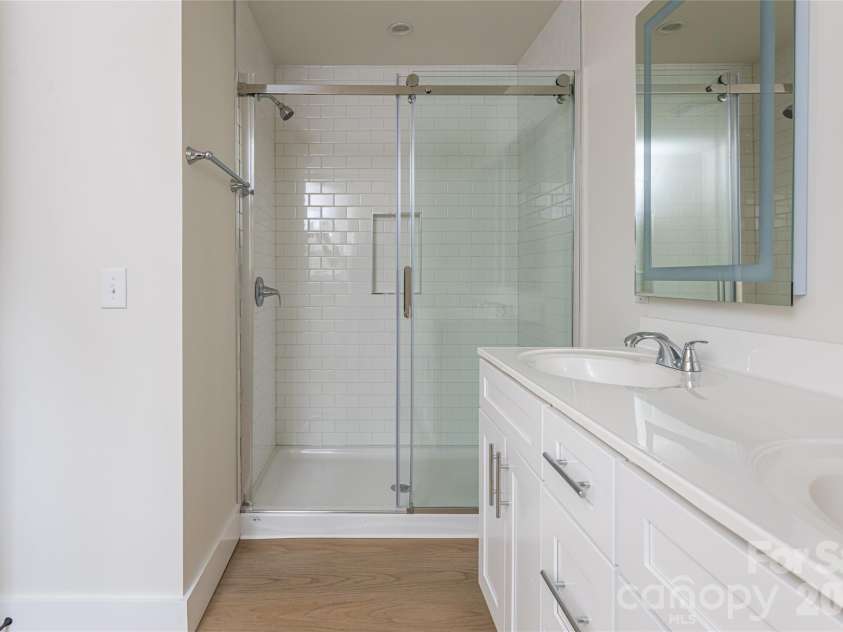 169 Cascade Ridge Road, Fairview, NC 28730.  MLS# CAR4351388, YatesRealty ID 20936. Owner's Bath