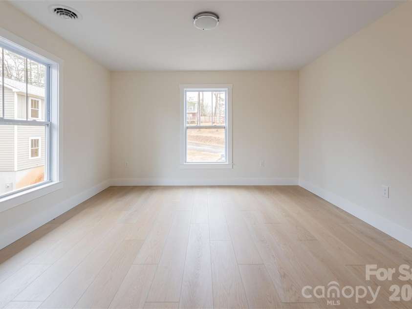 169 Cascade Ridge Road, Fairview, NC 28730.  MLS# CAR4351388, YatesRealty ID 20936. Owner's Bedroom