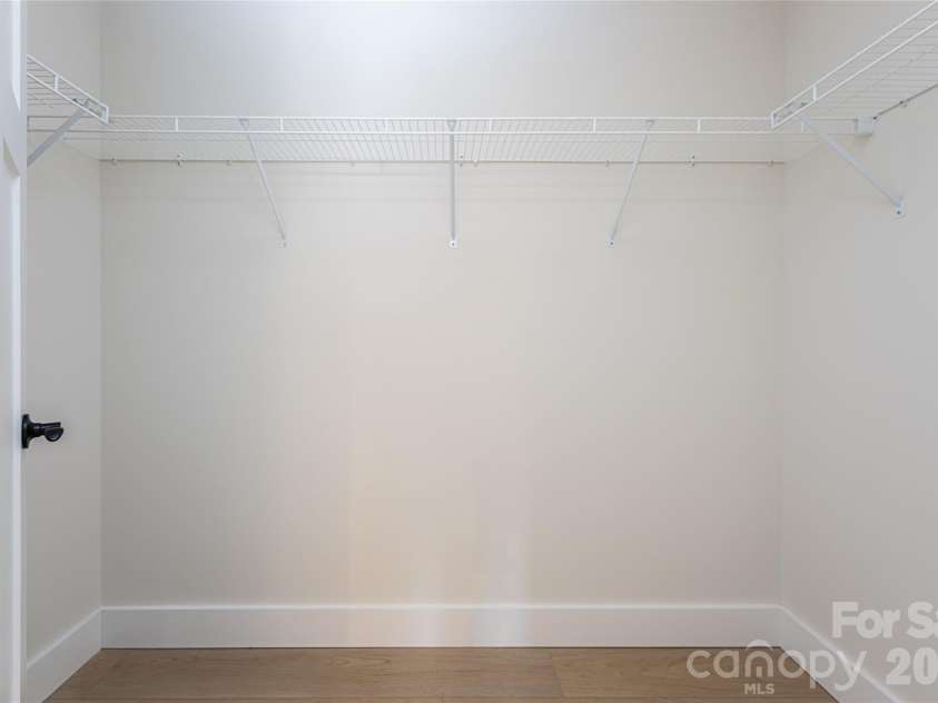 169 Cascade Ridge Road, Fairview, NC 28730.  MLS# CAR4351388, YatesRealty ID 20936. Owner's Walk-In Closet