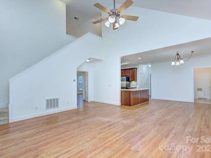 8044 Hawk Crest Court, Charlotte, NC 28270.  MLS# CAR4267919, YatesRealty ID 20940. Family room view into kitchen/breakfast area