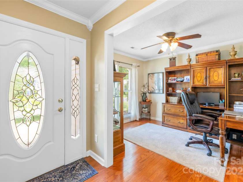4313 Wynborough Lane, Charlotte, NC 28269.  MLS# CAR4271807, YatesRealty ID 20945. From the front door, beautiful hardwood floors and a a front office with great windows.