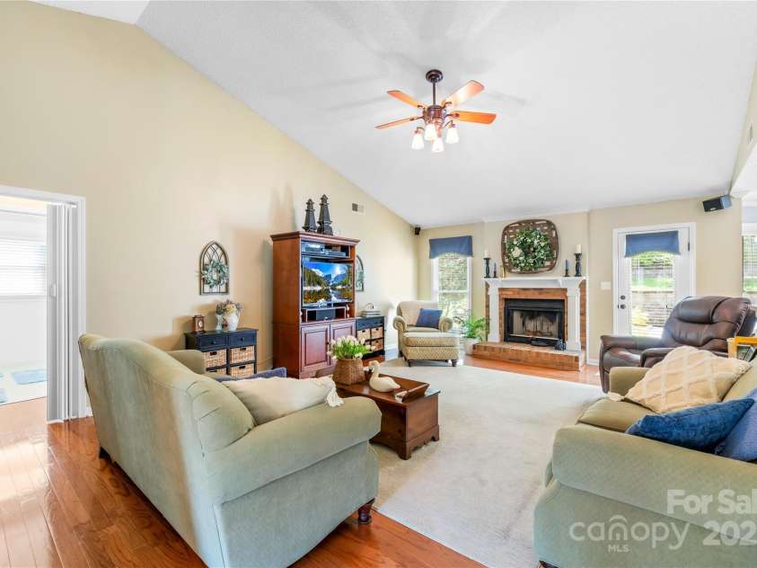 4313 Wynborough Lane, Charlotte, NC 28269.  MLS# CAR4271807, YatesRealty ID 20945. Vaulted family room with brick surround fireplace, real wood burning or you can add gas logs.