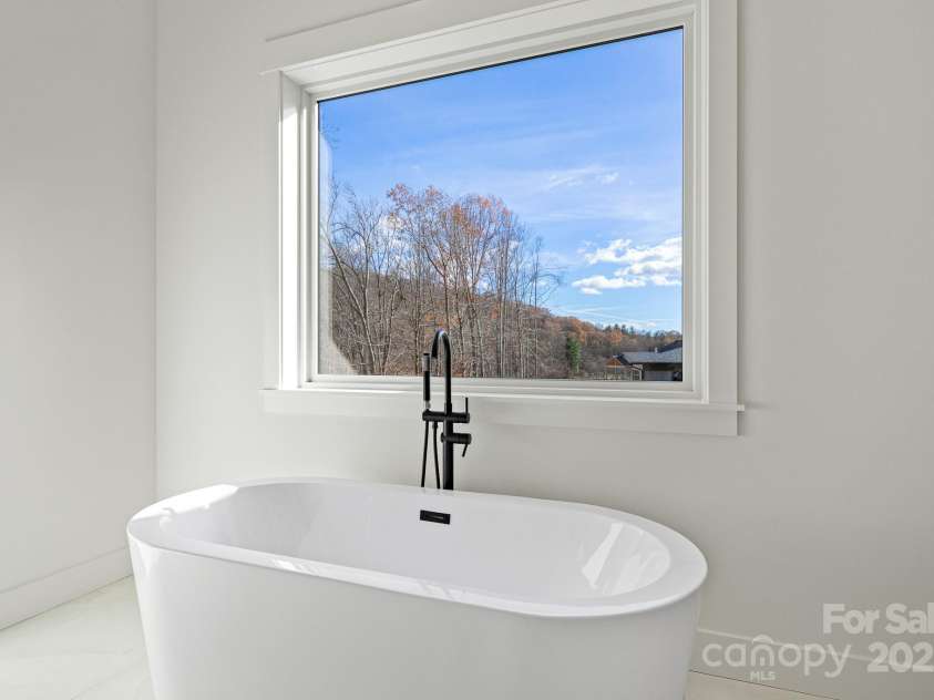 90 Bridgeway Drive, Candler, NC 28715.  MLS# CAR4226175, YatesRealty ID 20950. 