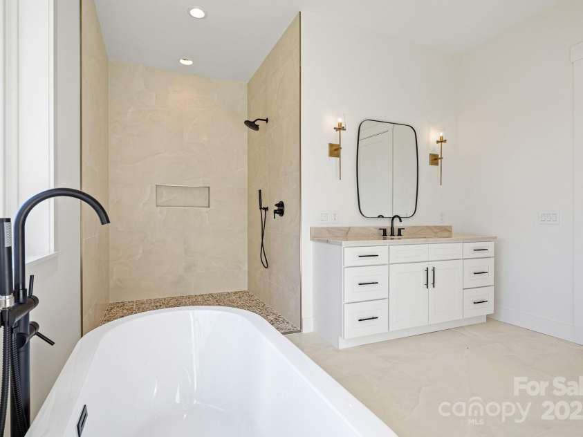 90 Bridgeway Drive, Candler, NC 28715.  MLS# CAR4226175, YatesRealty ID 20950. 