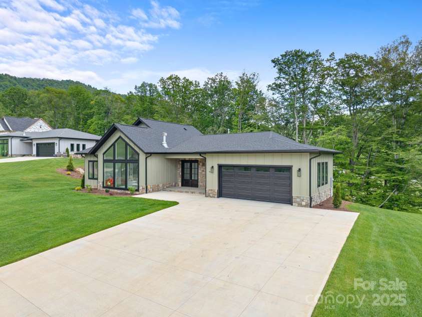 90 Bridgeway Drive, Candler, NC 28715.  MLS# CAR4226175, YatesRealty ID 20950. 
