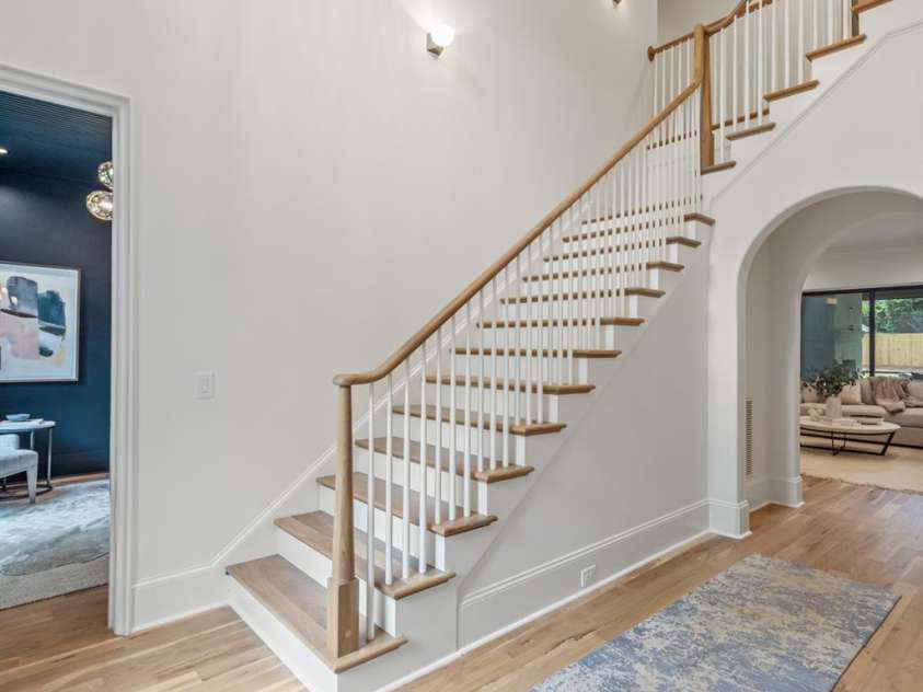 5124 Lansing Drive, Charlotte, NC 28270.  MLS# CAR4231364, YatesRealty ID 20951. Front foyer looking into the Office and the Great Room.  Beautiful site finished white oak hardwoods.
