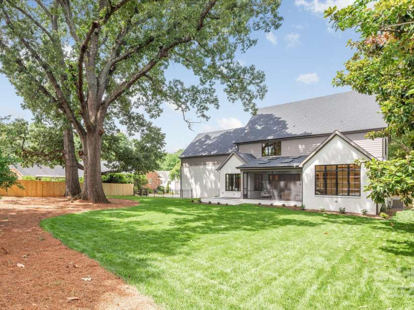 5124 Lansing Drive, Charlotte, NC 28270.  MLS# CAR4231364, YatesRealty ID 20951. Lovely backyard with mature trees.