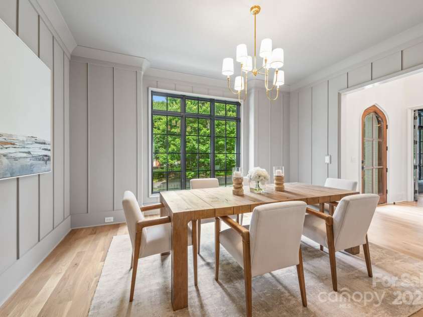 5124 Lansing Drive, Charlotte, NC 28270.  MLS# CAR4231364, YatesRealty ID 20951. Paneled Formal Dining Room.