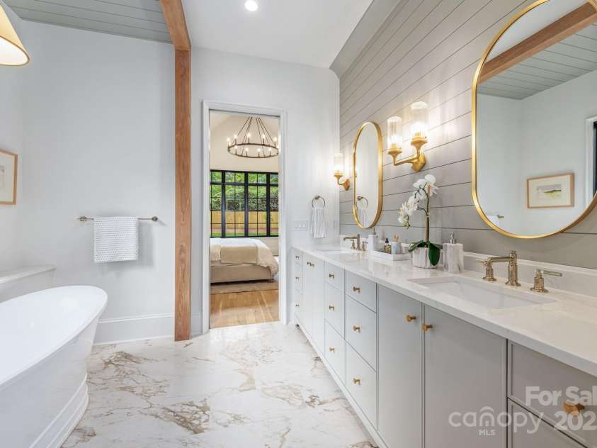 5124 Lansing Drive, Charlotte, NC 28270.  MLS# CAR4231364, YatesRealty ID 20951. Primary bath is a dream!  Double vanities and oversized soaking tub!