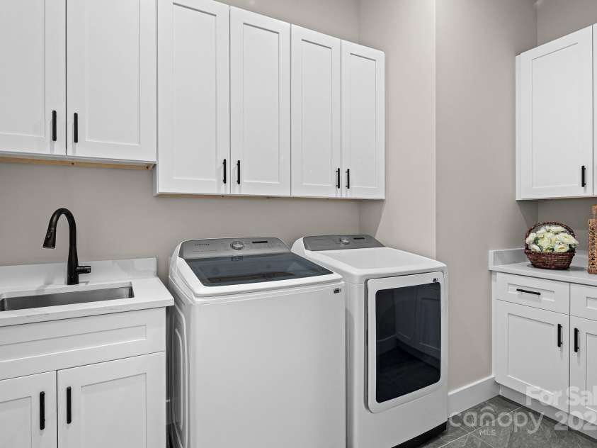 24 Slate Drive, Candler, NC 28715.  MLS# CAR4244090, YatesRealty ID 20953. Laundry