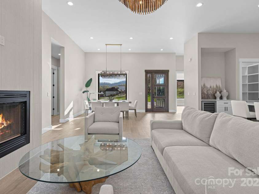 24 Slate Drive, Candler, NC 28715.  MLS# CAR4244090, YatesRealty ID 20953. Living+dining