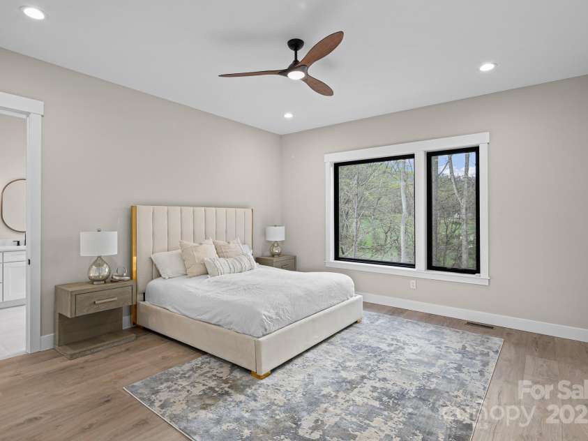 24 Slate Drive, Candler, NC 28715.  MLS# CAR4244090, YatesRealty ID 20953. Master bed