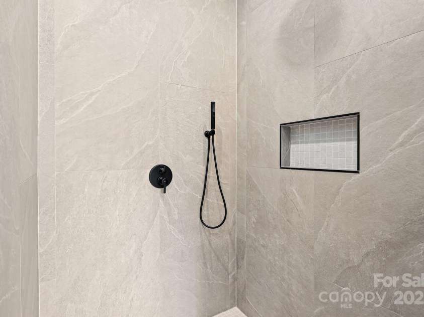 24 Slate Drive, Candler, NC 28715.  MLS# CAR4244090, YatesRealty ID 20953. Master shower