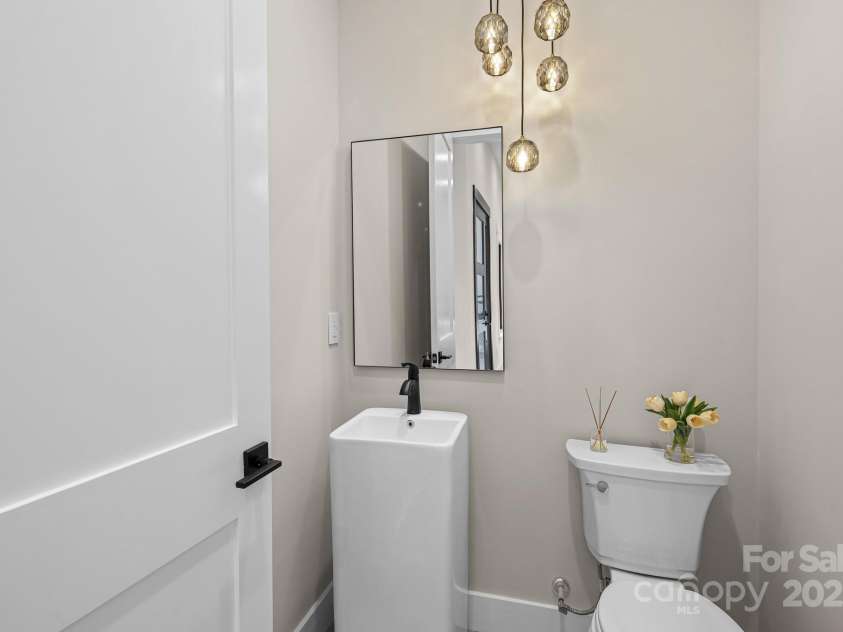 24 Slate Drive, Candler, NC 28715.  MLS# CAR4244090, YatesRealty ID 20953. Powder room