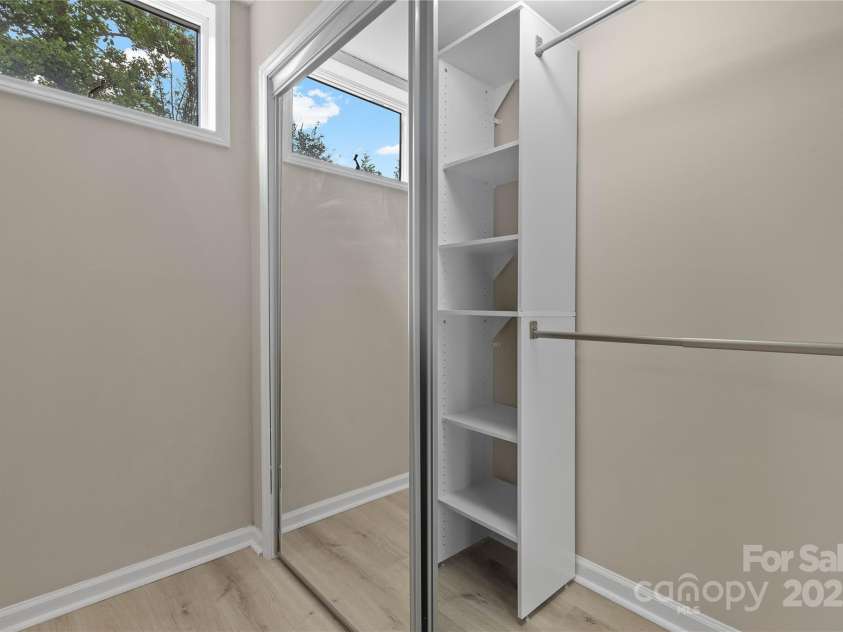 5916 Cashion Road, Huntersville, NC 28078.  MLS# CAR4266998, YatesRealty ID 20960. Basement Level Closet 4 Mirrored Closet w/ Organizers