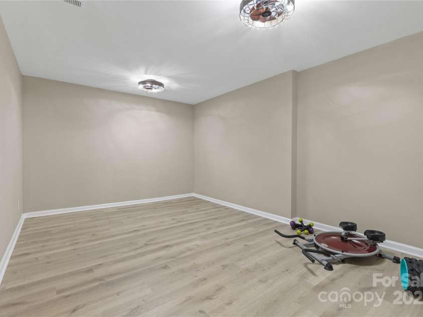 5916 Cashion Road, Huntersville, NC 28078.  MLS# CAR4266998, YatesRealty ID 20960. Basement Level Fitness Room