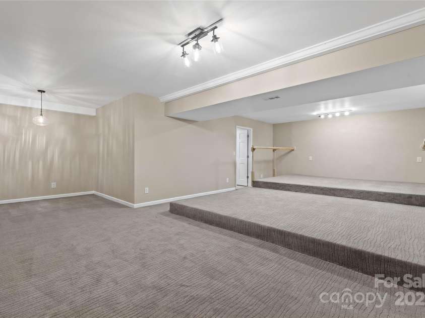 5916 Cashion Road, Huntersville, NC 28078.  MLS# CAR4266998, YatesRealty ID 20960. Basement Level Theater/Bedroom 5