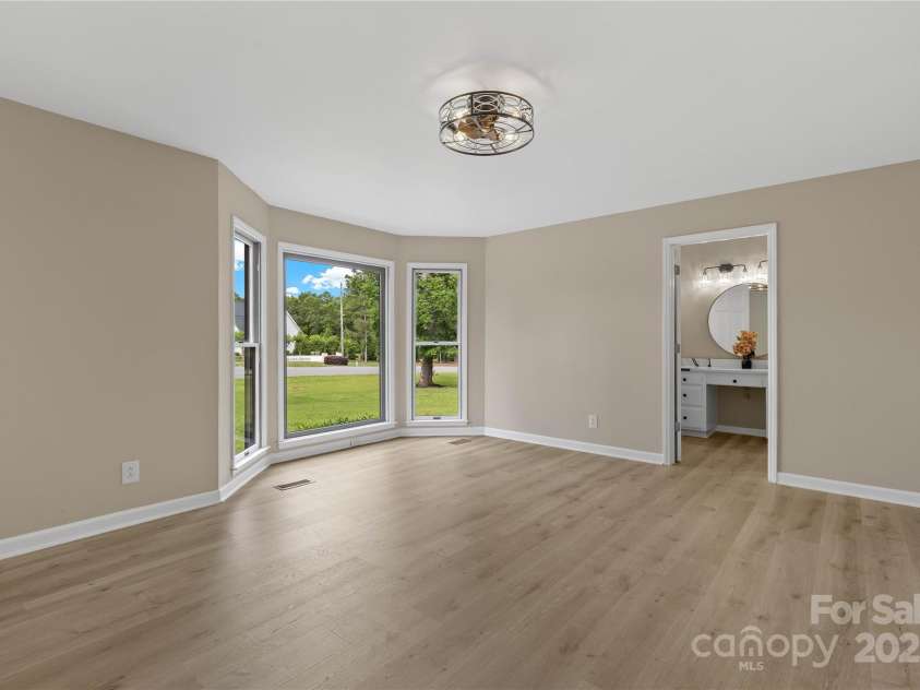 5916 Cashion Road, Huntersville, NC 28078.  MLS# CAR4266998, YatesRealty ID 20960. Primary Vanity and Closet Entrance