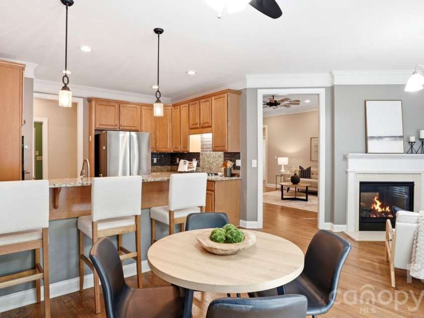 4089 Harmattan Drive, Denver, NC 28037.  MLS# CAR4377560, YatesRealty ID 20961. Breakfast Area & Fireside Sitting Area