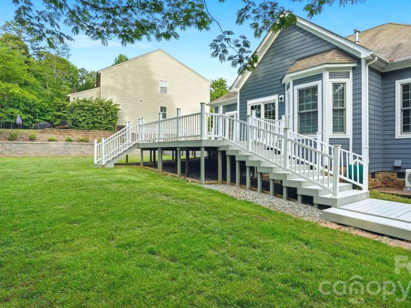 4089 Harmattan Drive, Denver, NC 28037.  MLS# CAR4377560, YatesRealty ID 20961. Deck Stairs leading to Gazebo
