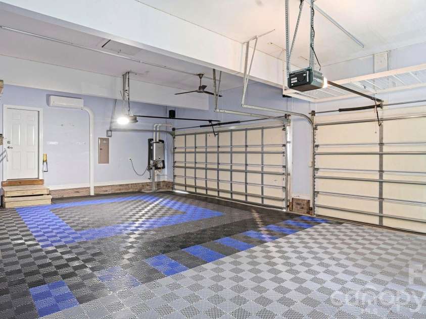 4089 Harmattan Drive, Denver, NC 28037.  MLS# CAR4377560, YatesRealty ID 20961. Mini Split, Race Deck Flooring, and Custom Shelving in Garage