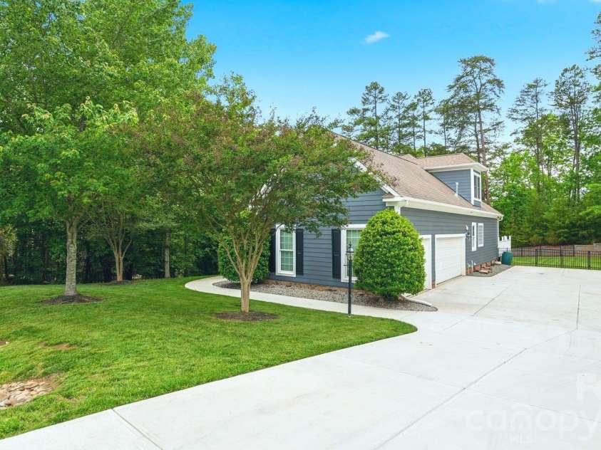 4089 Harmattan Drive, Denver, NC 28037.  MLS# CAR4377560, YatesRealty ID 20961. Three-Car Side Load Garage