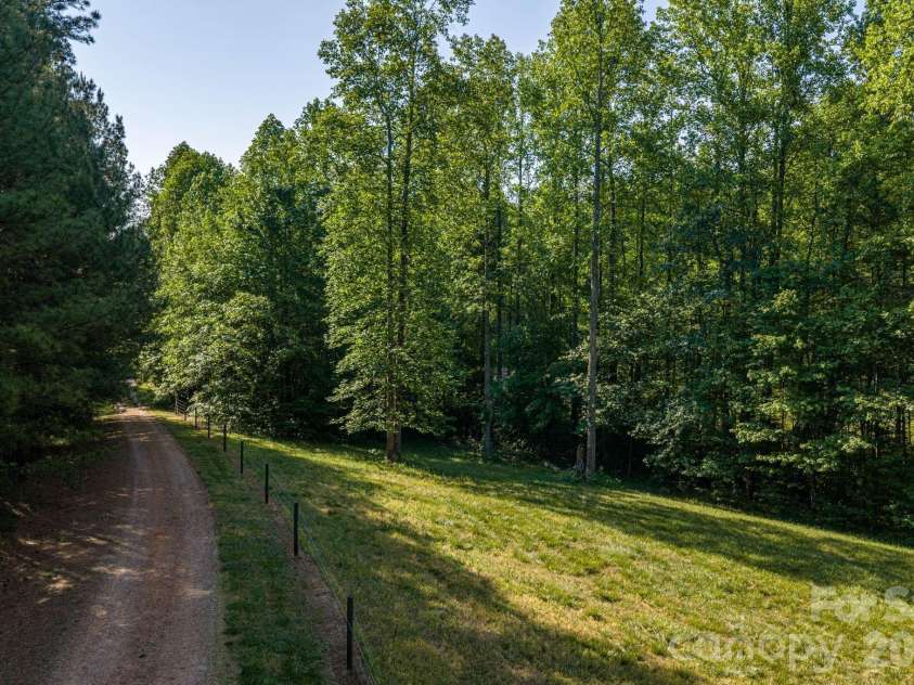 702 Saddlebrook Lane, Cherryville, NC 28021.  MLS# CAR4373701, YatesRealty ID 20966. Pasture and Driveway