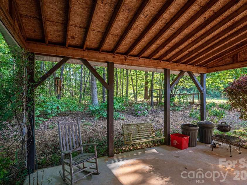 702 Saddlebrook Lane, Cherryville, NC 28021.  MLS# CAR4373701, YatesRealty ID 20966. Rear Covered Patio