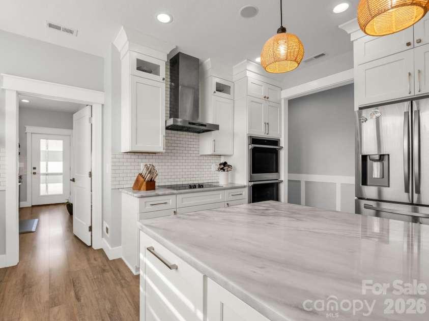 24 Chapel Hill Lane, Leicester, NC 28748.  MLS# CAR4354075, YatesRealty ID 20967. Primary Kitchen with Pantry