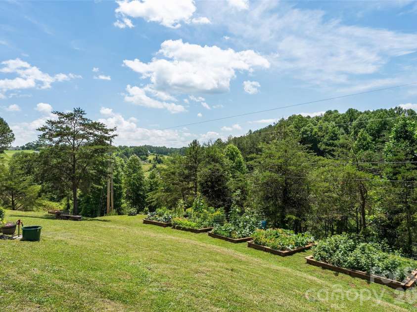 24 Chapel Hill Lane, Leicester, NC 28748.  MLS# CAR4354075, YatesRealty ID 20967. Raised Garden Beds